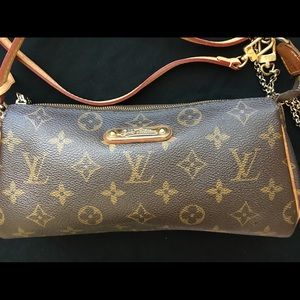 Louis Vuitton clutch with shoulder strap